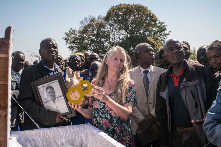 A reburial after bodies were exhumed